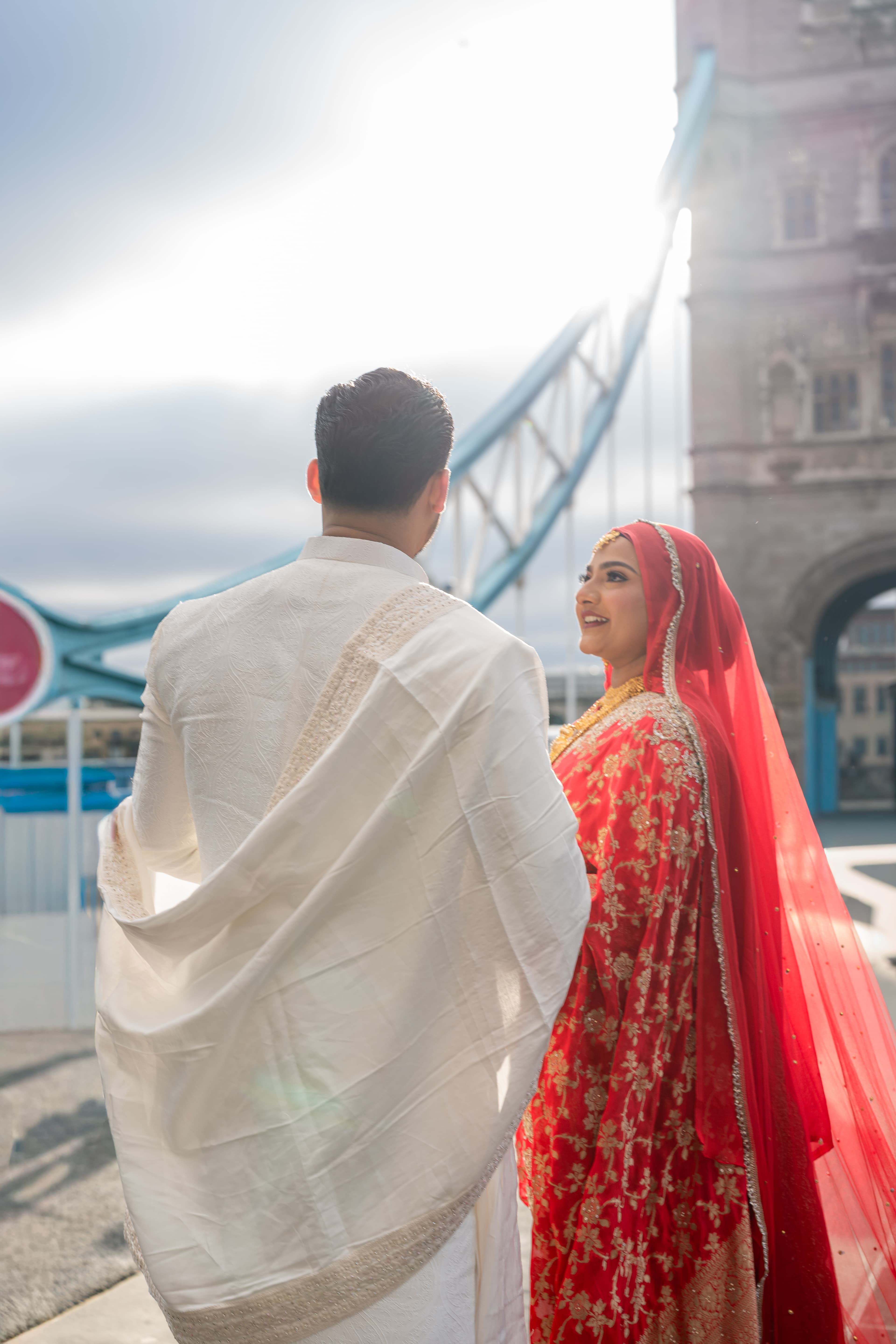 Couple photographed near Tower Bridge in London.